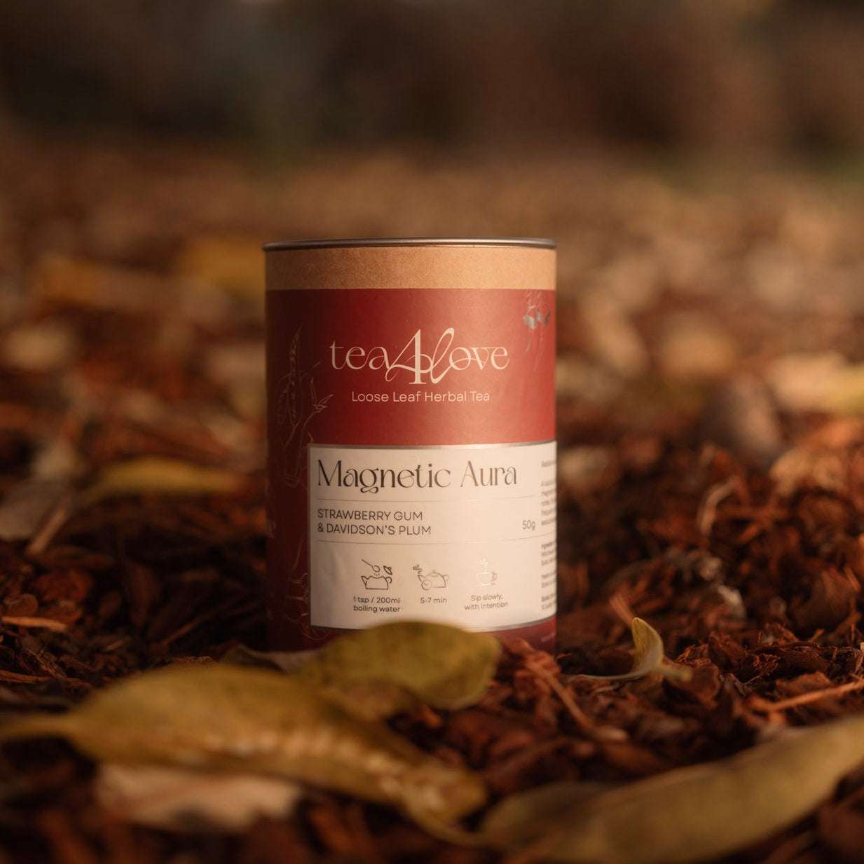 Tea4love Magnetic Aura tea canister on a leafy background